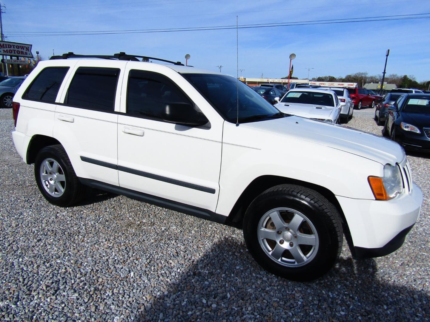 2009 WHITE Jeep Grand Cherokee (1J8GS48KX9C) , Automatic transmission, located at 15016 S Hwy 231, Midland City, AL, 36350, (334) 983-3001, 31.306210, -85.495277 - Photo#0